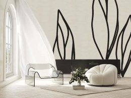 papier peint feuillage sur lin situation dans un salon avec 2 fauteuils modernes dans les couleurs beiges et noirs