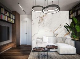 papier peint marbre naturel cuivre situation dans un salon avec des meubles en bois